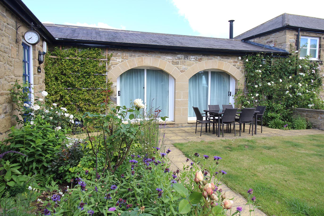 Wheatlands Cottage front private garden | Burradon Farm Houses & Cottages