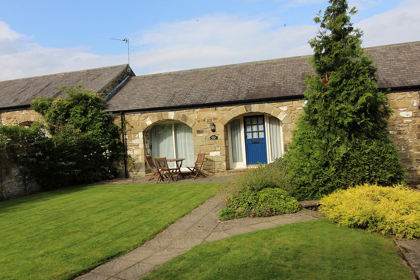 Honeysuckle Cottage front shared garden | Burradon Farm Houses & Cottages